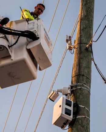 Teksys technician installing K60 from bucket truck