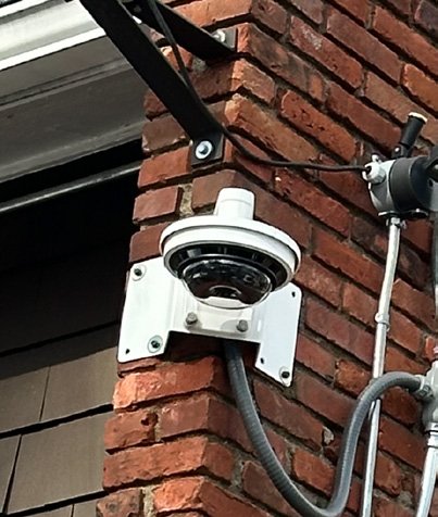 K60 radio mounted on brick wall